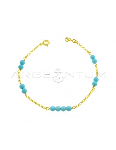 Diamond-coated rolò mesh bracelet with yellow gold plated turquoise paste spheres in 925 silver