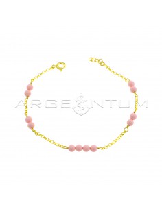 Diamond-coated rolò mesh bracelet with yellow gold plated pink coral paste spheres in 925 silver