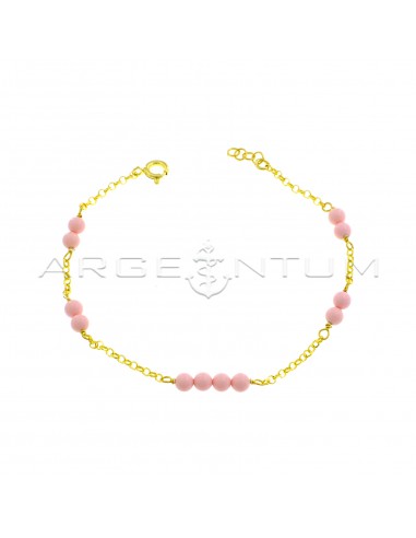 Diamond-coated rolò mesh bracelet with yellow gold plated pink coral paste spheres in 925 silver