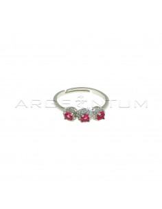 Adjustable trilogy ring with central red zircons in white zircon frames white gold plated in 925 silver