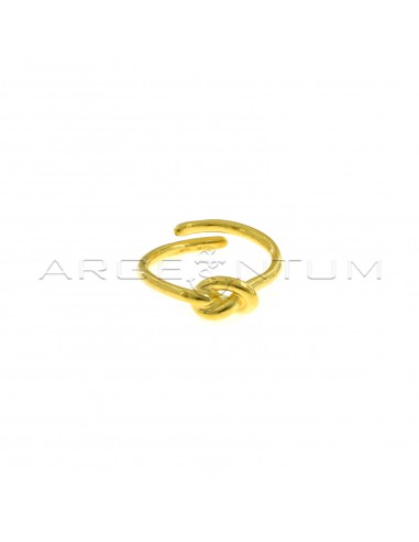 Adjustable wire ring with yellow gold plated central knot in 925 silver