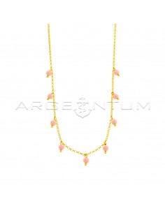 Diamond-coated rolo necklace with pendant spheres in pink coral paste, yellow gold plated in 925 silver