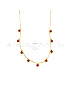 Diamond-coated rolo link necklace with pendant spheres in yellow gold plated coral paste in 925 silver