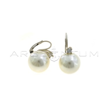 Pearl earrings ø 14 mm with white gold plated hook and white light point in 925 silver