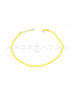 Yellow resin tube anklet with yellow gold plated terminals, closure and extension in 925 silver