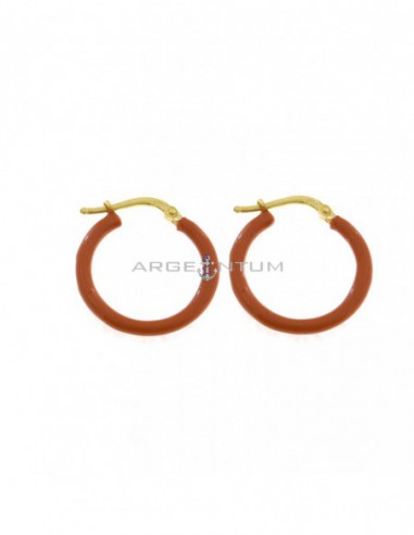 Yellow gold plated yellow gold-plated circle earrings with orange enameled snap closure in 925 silver