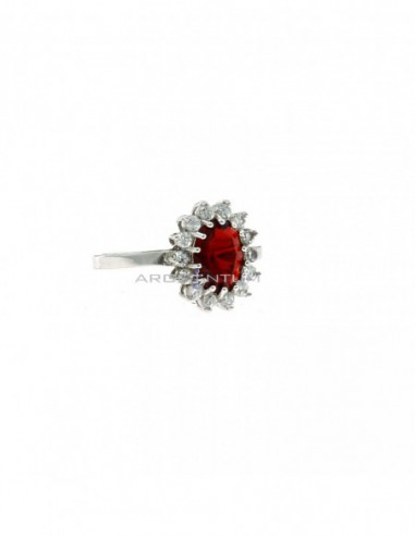 White gold plated ring with red oval stone 6x8 mm in a frame of white zircons with claws in 925 silver (Size 20)