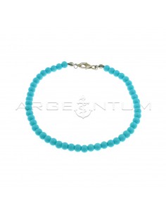 Ball bracelet in turquoise paste of ø 4 mm with white gold plated terminals and snap hook in 925 silver