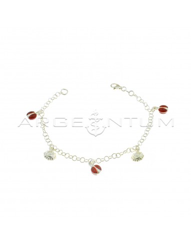 Giotto mesh bracelet with pendants coupled with enameled ladybugs alternating with engraved suns in 925 silver