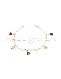 Giotto mesh bracelet with pendants coupled with enameled ladybugs alternating with butterflies engraved in 925 silver