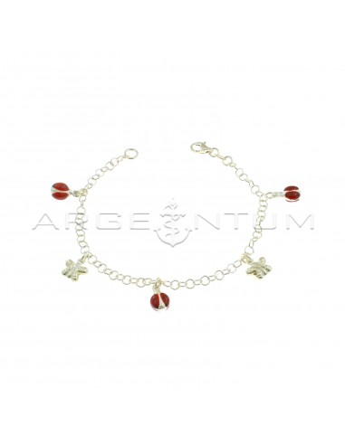 Giotto mesh bracelet with pendants coupled with enameled ladybugs alternating with butterflies engraved in 925 silver