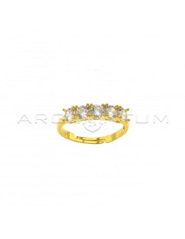 Adjustable ring with 5 white zircons of 3 mm yellow gold plated in 925 silver