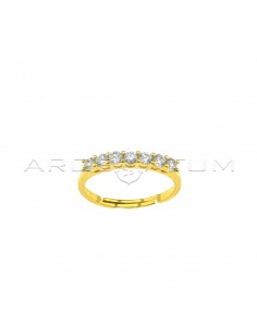 Adjustable ring with 7 white zircons of 2.5 mm yellow gold plated in 925 silver
