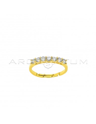 Adjustable ring with 7 white zircons of 2.5 mm yellow gold plated in 925 silver