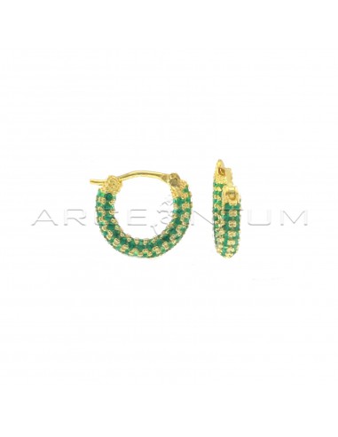 Green zircon tubular hoop earrings with yellow gold plated bridge clasp in 925 silver