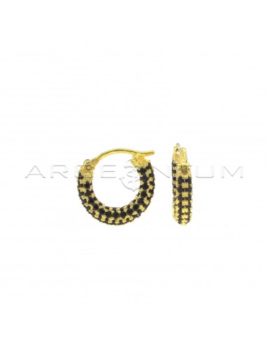 Black zircon tubular hoop earrings with yellow gold plated bridge clasp in 925 silver