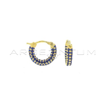 Blue zircon tubular hoop earrings with yellow gold plated bridge clasp in 925 silver