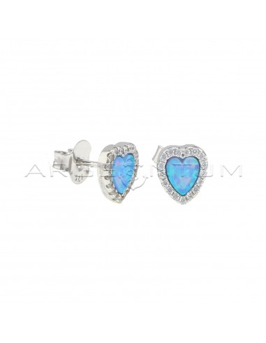 Heart lobe earrings with opalescent blue stone in a frame of white zircons plated white gold in 925 silver