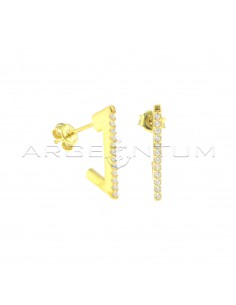 White semizirconated triangular lobe earrings with yellow gold plated snap attachment in 925 silver