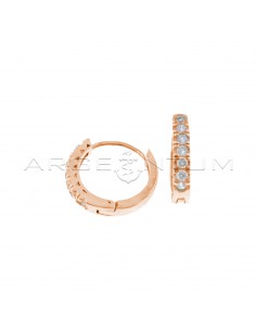 Hoop earrings with white zircons with rose gold plated snap closure in 925 silver