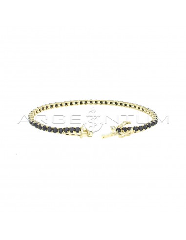 Yellow gold plated tennis bracelet...