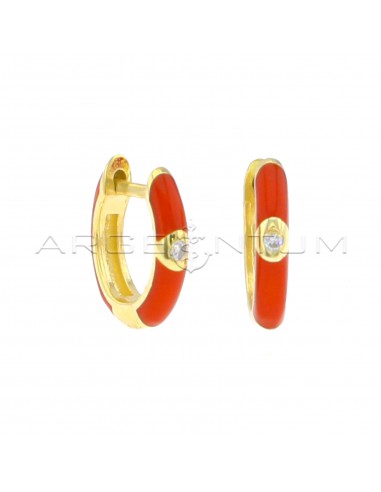 Orange enameled hoop earrings with...