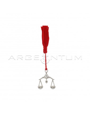 Libra metal pendant with red tassel