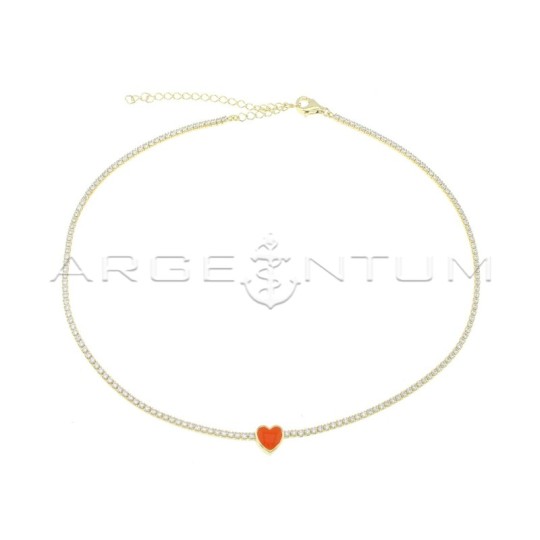 Tennis necklace of white zircons with central orange enameled heart, yellow gold plated in 925 silver