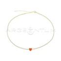 Tennis necklace of white zircons with central orange enameled heart, yellow gold plated in 925 silver