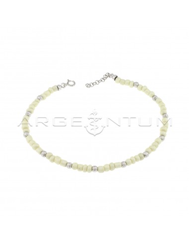 Anklet with white resin tubes and...