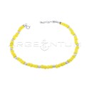 Cavigliera con tubetti in resina gialla e sfere diamantate placcata oro bianco in argento 925