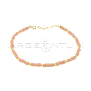 Anklet with powder pink resin tubes and yellow gold plated diamond spheres in 925 silver