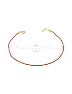 Anklet of red faceted...