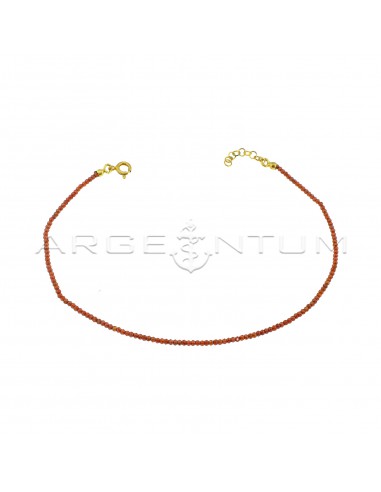 Anklet of red faceted zircons yellow...