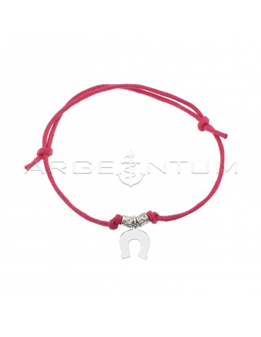 Fuchsia cord bracelet with slip...
