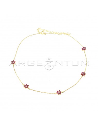Forced link necklace with red zircon...