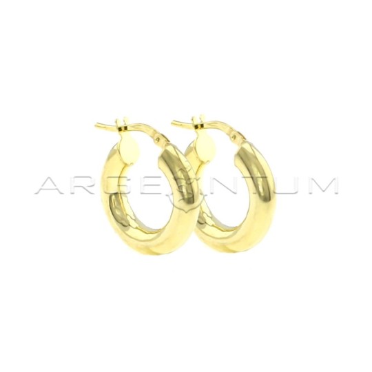Orecchini a cerchio canna tubolare ø 18 mm con chiusura a scattino placcati oro giallo in argento 925
