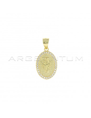 Miraculous medal on a dotted base in...