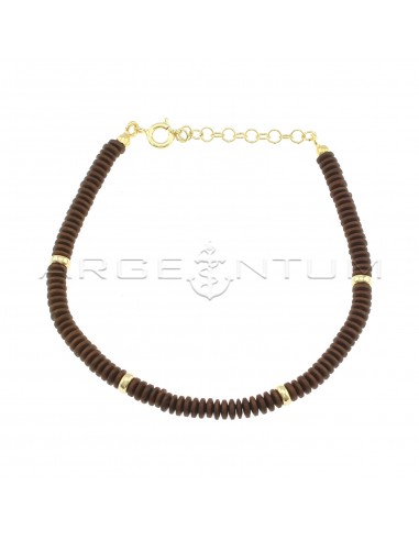 Bracelet with washers in satin brown...
