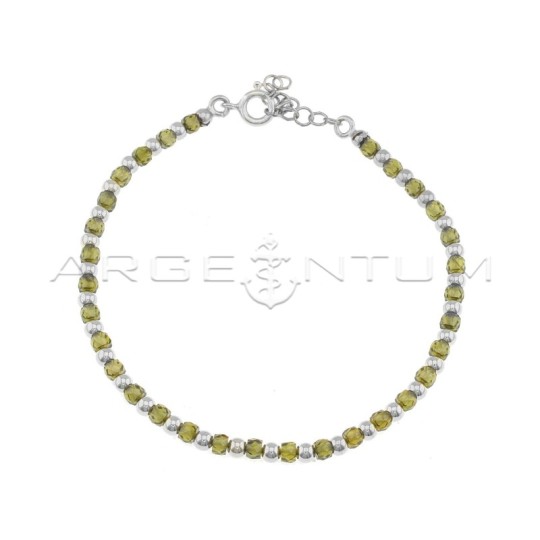 White gold plated ball bracelet and green zircons in 925 silver