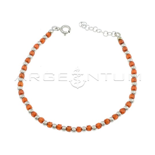 Bracelet with balls and faceted red zircons in white gold plated 925 silver