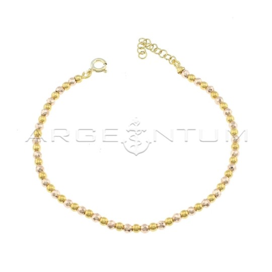 Pink faceted hematite bracelet and yellow gold plated shiny spheres in 925 silver