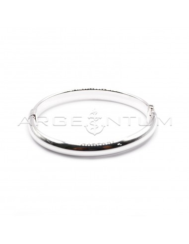 Rigid bracelet with rounded band in...