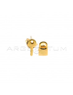 Stud earrings with key and...