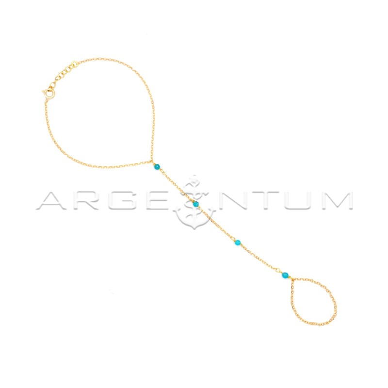 Baciamano maglia rolò diamantata e cristalli verde acqua marina  placcato oro giallo in argento 925