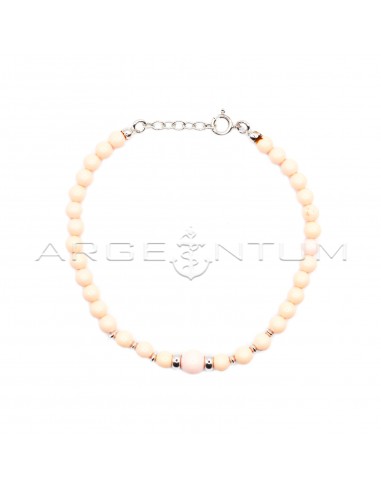 Ball bracelet in pink coral paste...
