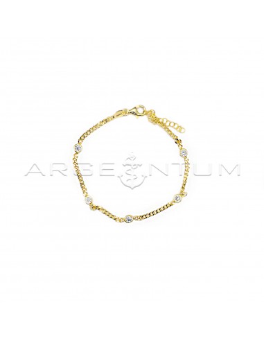 Curb link bracelet with yellow gold...