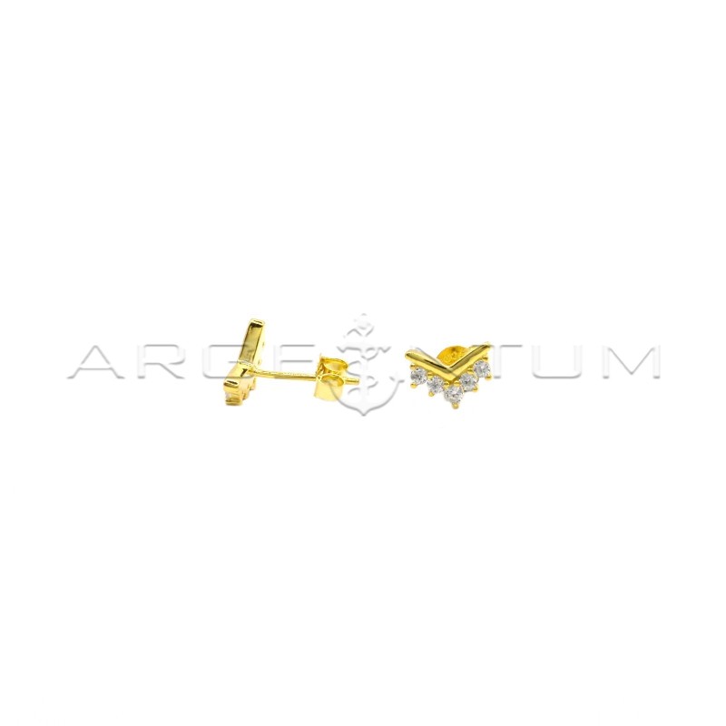Stud earrings with V pressure attachment with row of yellow gold plated white zircons in 925 silver