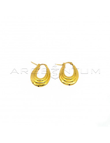 Oval rounded hoop earrings with...