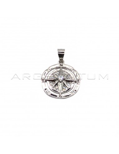 Compass rose pendant on a white and...